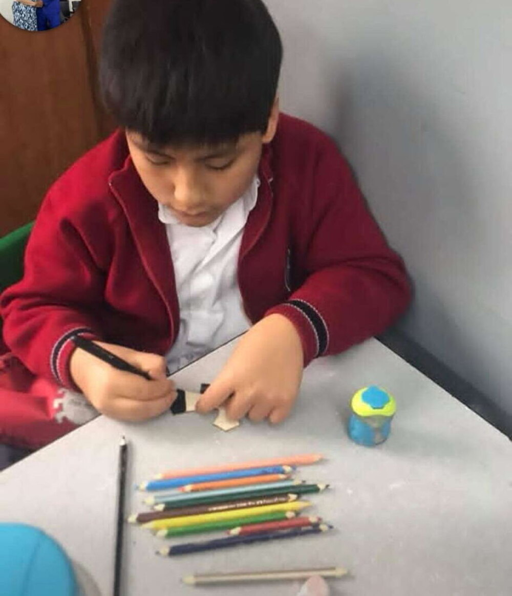 A pupil at work at Pioneer Christian School