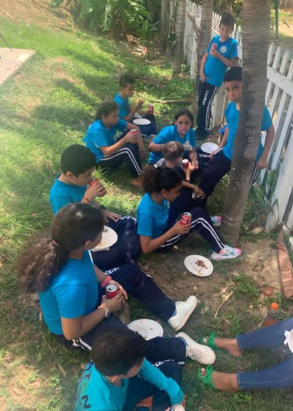 Pupils outdoors at Solid Rock Education Center